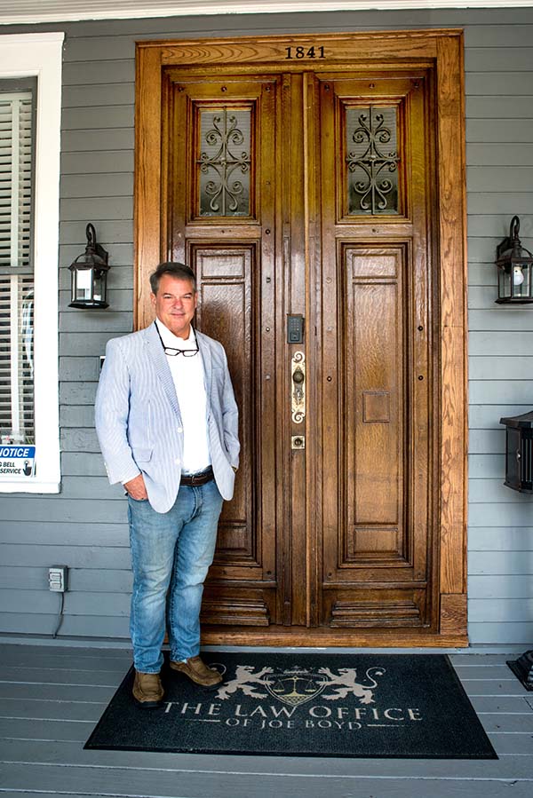 Joe Boyd at the front door of his office building